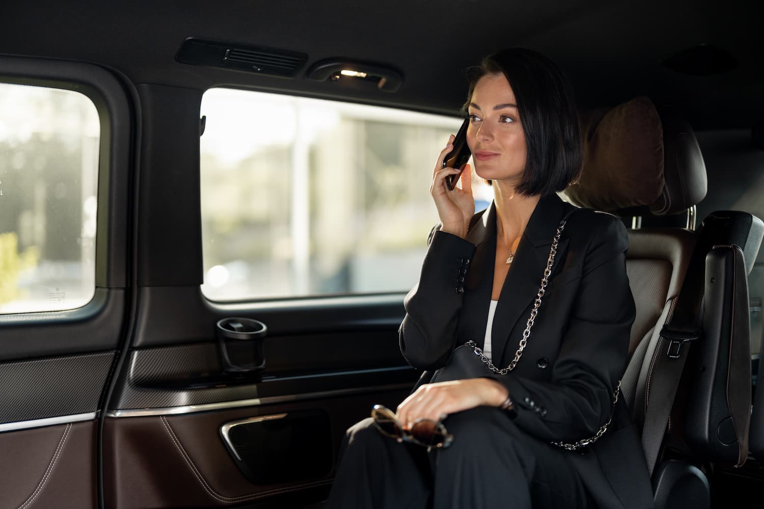 business-lady-with-phone-in-car-2025-03-18-07-40-29-utc-1.jpg